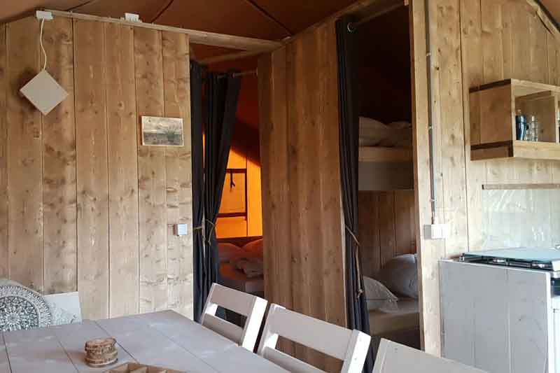 Our safari tents op Camping Ketjil in Oostvoorne - The bedroom